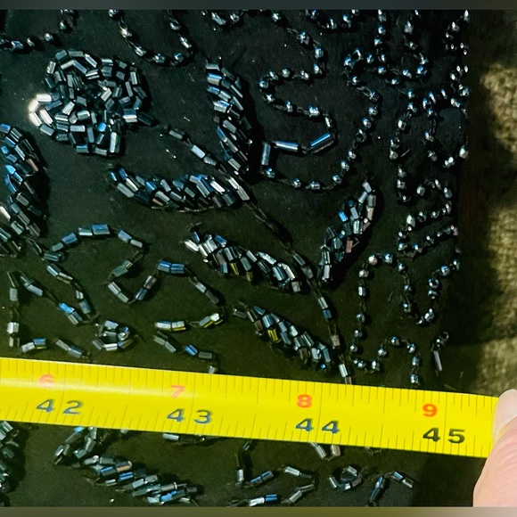 A gorgeous mid length beaded dress by Scala. - Picture 8 of 11